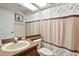 Bathroom featuring a shower curtain and a vanity at 4508 Netherwood Dr, Tampa, FL 33624