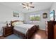 Bedroom with hardwood floors and traditional furnishings at 4508 Netherwood Dr, Tampa, FL 33624