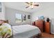 Bedroom with hardwood floors and traditional furnishings at 4508 Netherwood Dr, Tampa, FL 33624