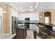 A stylish kitchen features granite countertops, stainless steel appliances, and ample cabinet space at 4508 Netherwood Dr, Tampa, FL 33624