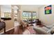 Spacious living room features comfortable seating and access to the covered patio and pool area at 4508 Netherwood Dr, Tampa, FL 33624