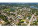 A peaceful neighborhood with tree-lined streets and a small lake, offering a serene living environment at 4706 E Sligh Ave, Tampa, FL 33610