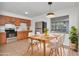 Eat-in kitchen with modern appliances and adjacent dining area provides a welcoming space to eat at 4706 E Sligh Ave, Tampa, FL 33610