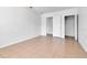 Bright living room with neutral tile flooring and white walls at 4706 E Sligh Ave, Tampa, FL 33610