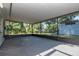 Expansive screened-in patio, perfect for entertaining and enjoying the outdoors, with ample space for seating at 4706 E Sligh Ave, Tampa, FL 33610