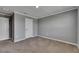 This bedroom has neutral walls, carpeted floor, and white trim at 5026 Bromeliad Ave, Wimauma, FL 33598