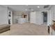Expansive bonus room with soft carpet, neutral colors, and ample space for various activities at 5026 Bromeliad Ave, Wimauma, FL 33598