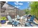Enjoy outdoor living on the brick patio with Adirondack chairs at 5026 Bromeliad Ave, Wimauma, FL 33598