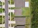 Aerial view showcasing a well-manicured backyard with lush green grass and perimeter fence, enhancing outdoor privacy and appeal at 5410 Amaryllis Garden St, Apollo Beach, FL 33572