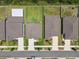 Overhead shot of a home's backyard with a neatly kept lawn and privacy fence, nestled in a well-maintained residential area at 5410 Amaryllis Garden St, Apollo Beach, FL 33572