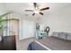 Bedroom featuring a ceiling fan, closet, and vanity at 5410 Amaryllis Garden St, Apollo Beach, FL 33572
