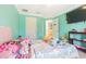 Cozy bedroom with tile floors, and two doors at 5432 Queen Ave, Spring Hill, FL 34609
