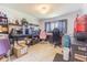 Home office with tile floors, bright lighting, a window and two office chairs at 5432 Queen Ave, Spring Hill, FL 34609