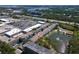 Aerial view of the property showcasing the building's layout, parking, and nearby community amenities at 8181 Eagles Park N Dr, St Petersburg, FL 33709