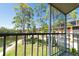Breezy balcony offers scenic views of lush trees, green lawns, and community features at 8181 Eagles Park N Dr, St Petersburg, FL 33709
