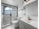 Updated bathroom features a walk-in shower, modern vanity, and contemporary fixtures at 8451 81St Way, Seminole, FL 33777