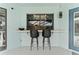 Charming outdoor bar area with seating, perfect for entertaining at 8638 Chadwick Dr, Tampa, FL 33635
