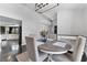 Well-lit dining room with views into the kitchen, showcasing an open layout perfect for entertaining at 8638 Chadwick Dr, Tampa, FL 33635