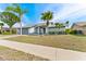 A pleasant single-story home with a garage and lovely landscaping at 8638 Chadwick Dr, Tampa, FL 33635