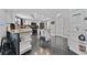 Modern kitchen with granite countertops, stainless steel appliances, and ample cabinet space for storage at 8638 Chadwick Dr, Tampa, FL 33635