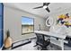 Bright office space offers a stunning view of the lake and an exercise area at 8638 Chadwick Dr, Tampa, FL 33635
