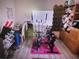 Bedroom with exercise equipment, hardwood floors, and a cozy office space at 910 Robinson N Dr, St Petersburg, FL 33710