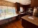 Kitchen featuring custom cabinets, granite counters, and stainless appliances at 910 Robinson N Dr, St Petersburg, FL 33710