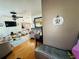 Open-concept living room with hardwood floors, stylish decor, and a cozy seating area at 910 Robinson N Dr, St Petersburg, FL 33710
