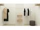 Walk-in closet with shelving, hanging space, and a functional design at 9558 Runaway Breeze Dr, Land O Lakes, FL 34637