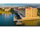 Waterfront condo building with a boat dock and stunning water views at 100 Bluff View Dr # 514C, Belleair Bluffs, FL 33770