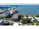 Aerial view of the property showcasing its proximity to the water and surrounding neighborhood at 100 Bluff View Dr # 514C, Belleair Bluffs, FL 33770