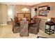 Elegant dining room featuring a chandelier, decorative chairs, and stylish buffet at 100 Bluff View Dr # 514C, Belleair Bluffs, FL 33770