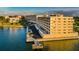 Waterfront condo building showcasing waterfront views with boat dockage and resident parking at 100 Bluff View Dr # 514C, Belleair Bluffs, FL 33770