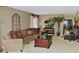 Cozy living room featuring a comfortable couch and elegant furnishings at 100 Bluff View Dr # 514C, Belleair Bluffs, FL 33770