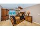 Comfortable main bedroom suite offers a ceiling fan and a beautiful view of the water at 100 Bluff View Dr # 514C, Belleair Bluffs, FL 33770