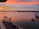 Enjoy this beautiful waterfront view at sunset overlooking boats and the city skyline at 100 Bluff View Dr # 514C, Belleair Bluffs, FL 33770