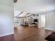Spacious living area with kitchen, comfortable seating, bright light and hardwood floors at 1014 Sylvia Ln, Tampa, FL 33613