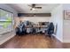 Spacious office with hardwood floors and ceiling fan, perfect for working from home at 1014 Sylvia Ln, Tampa, FL 33613