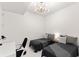 Bedroom featuring two beds and modern lighting at 1020 Sunset Point Rd # 410, Clearwater, FL 33756