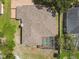 Overhead view of the home's roof, backyard, lanai and pool at 10306 Shalimar Wood Dr, Thonotosassa, FL 33592