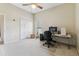 Bedroom featuring neutral walls, carpet, ceiling fan, and a closet at 10306 Shalimar Wood Dr, Thonotosassa, FL 33592