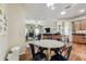 Open concept dining area connects kitchen and living room, great for entertaining at 10306 Shalimar Wood Dr, Thonotosassa, FL 33592