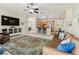 An open-concept living room with a seamless transition to the kitchen and dining area at 10306 Shalimar Wood Dr, Thonotosassa, FL 33592