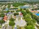 Aerial shot showcasing the property's location within a residential neighborhood near a pond at 11726 S Stone Ln, Riverview, FL 33569