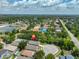 A beautiful aerial view displays the property's prime location with nearby pond and landscaping at 11726 S Stone Ln, Riverview, FL 33569