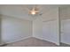 Cozy bedroom with plush carpeting, ceiling fan, closet and freshly painted walls, perfect for relaxation and rest at 11726 S Stone Ln, Riverview, FL 33569