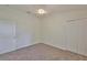 Inviting bedroom with neutral walls, plush carpet, a closet, and a ceiling fan for added comfort at 11726 S Stone Ln, Riverview, FL 33569
