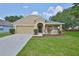 Charming single-story home with a well-manicured lawn and inviting front porch at 11726 S Stone Ln, Riverview, FL 33569