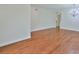Hardwood floors and neutral walls offer a versatile space, perfect for comfortable living and entertaining at 11726 S Stone Ln, Riverview, FL 33569
