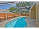 Relaxing screened-in pool area with ample space for lounging and outdoor enjoyment at 11726 S Stone Ln, Riverview, FL 33569